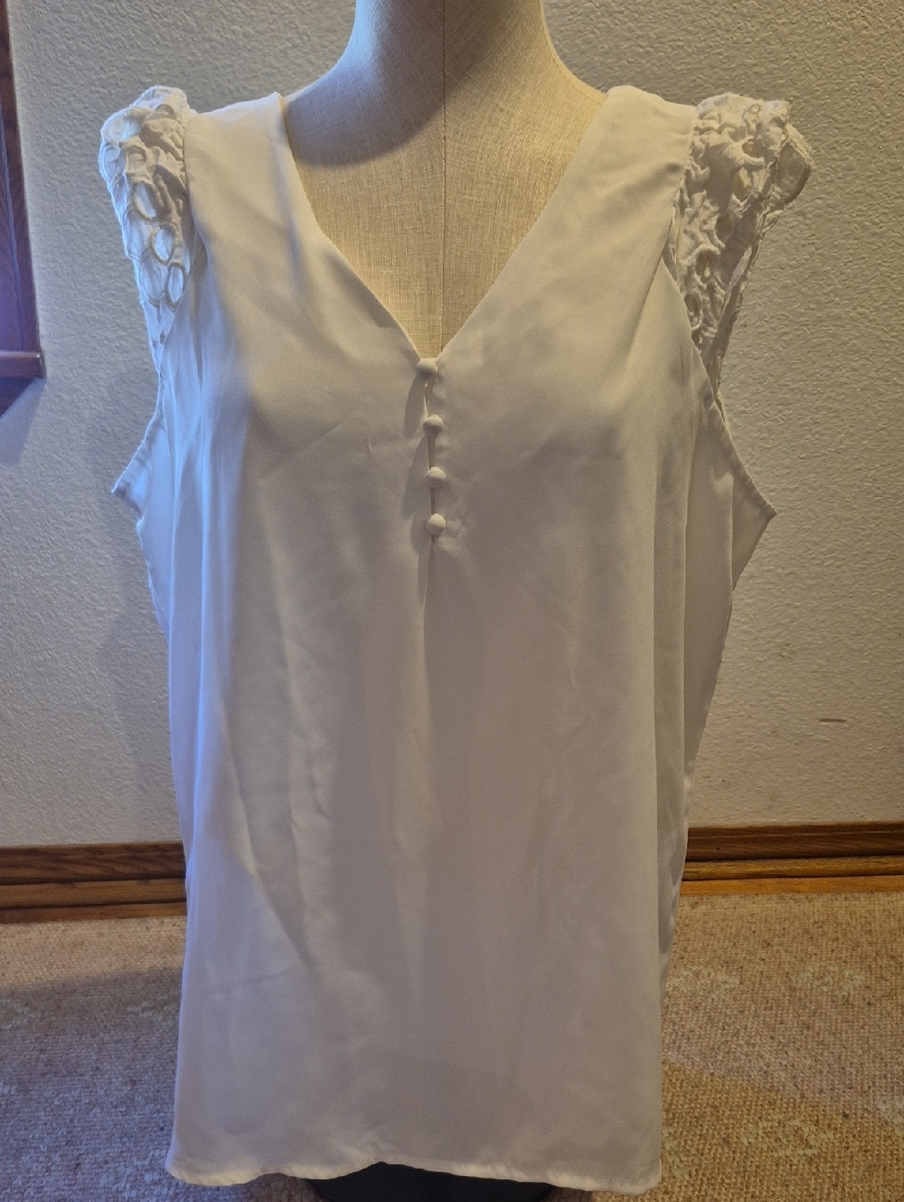Sleeveless White V-Neck Blouse with Lace Shoulders